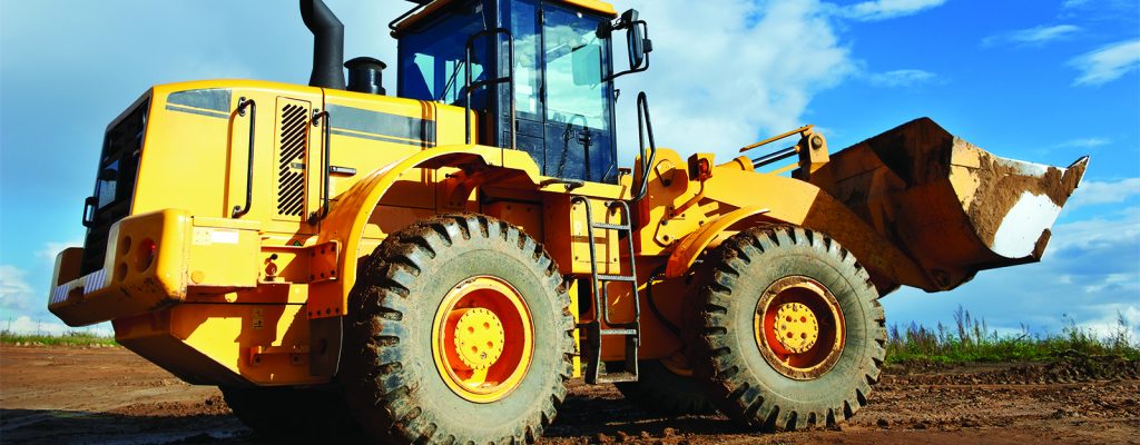 Photo of a yellow bulldozer.