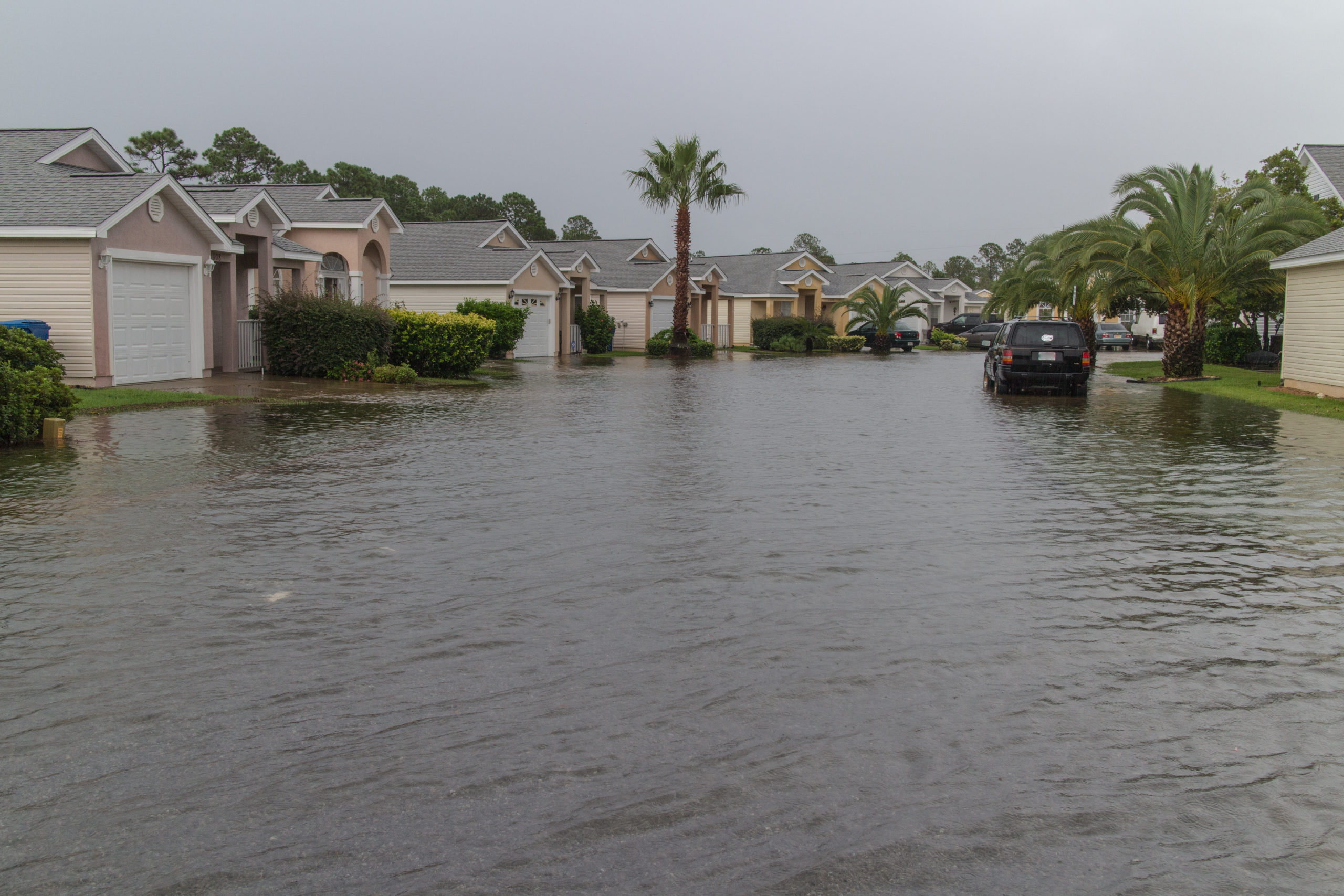 Photo of a flooded residential street in Florida.