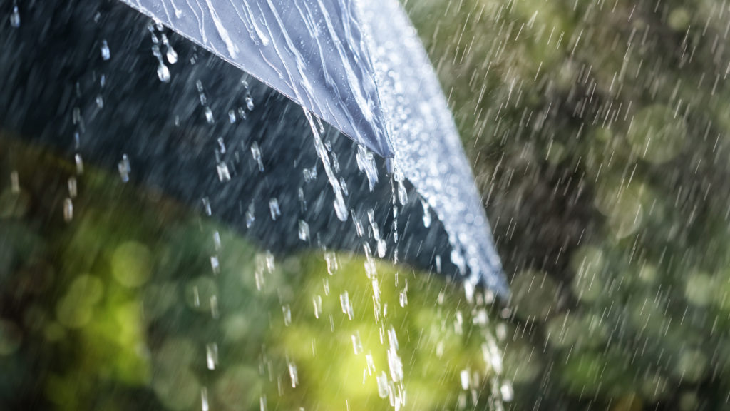 Rain dripping off an umbrella.